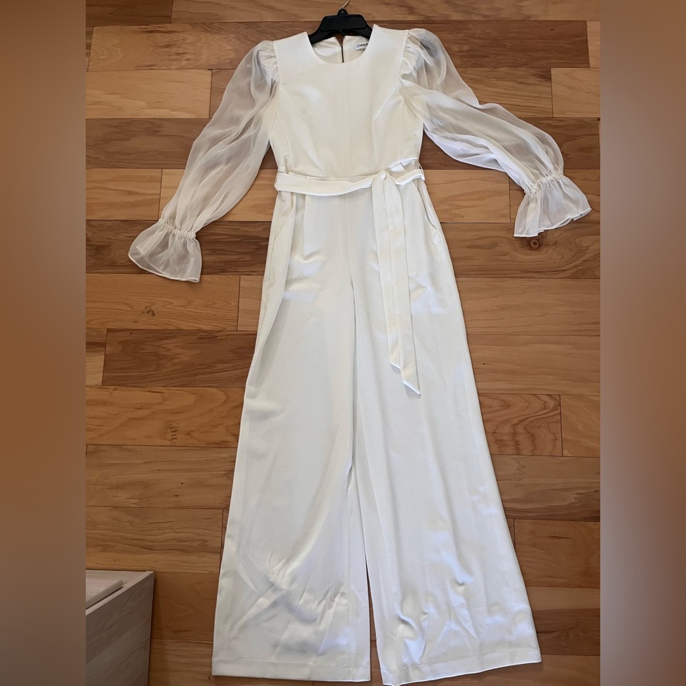 Elegant White Jumpsuit with Sheer Sleeves